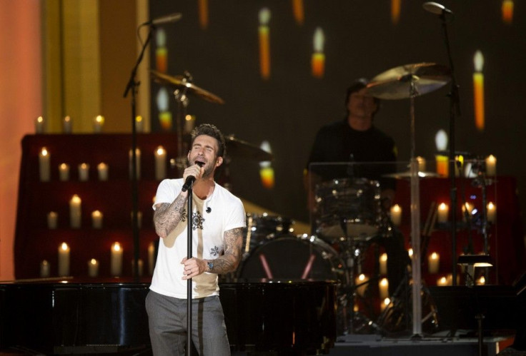 Singer Adam Levine of Maroon 5 performs during the taping of &quot;A Very GRAMMY Christmas&quot; at the Shrine Auditorium in Los Angeles, California November 18, 2014. The show airs December 5.