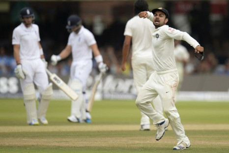 India&#039;s Virat Kohli reacts as England&#039;s Matt Prior (2nd L) is dismissed during the second cricket test match at Lord&#039;s cricket ground in London July 21, 2014