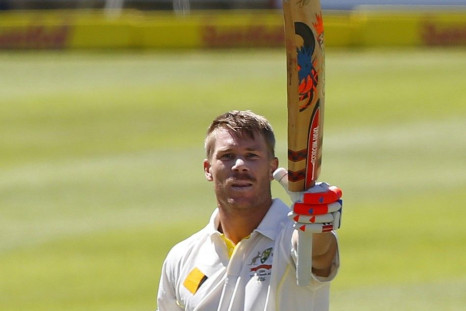 Australia&#039;s David Warner celebrates his century on the first day of their third test cricket match against South Africa in Cape Town, March 1, 2014.