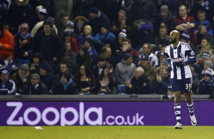 West Bromwich Albion&#039;s Nicolas Anelka is seen in front of their sponsor&#039;s advertising board during their English Premier League soccer match against Everton at The Hawthorns in West Bromwich, central England January 20, 2014.