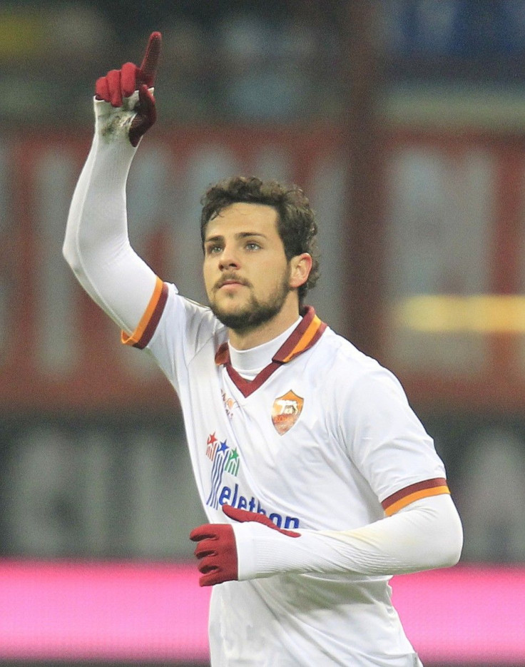 AS Roma&#039;s Mattia Destro celebrates after scoring against AC Milan during their Italian Serie A soccer match at San Siro stadium in Milan December 16, 2013.