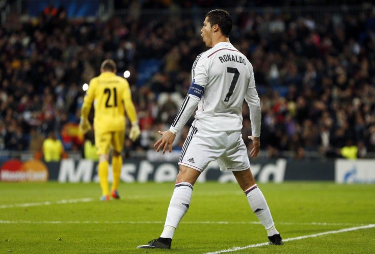 Real Madrid&#039;s Cristiano Ronaldo celebrates scoring a penalty kick during their Champions League Group B soccer match against Ludogorets at Santiago Bernabeu stadium in Madrid December 9, 2014.