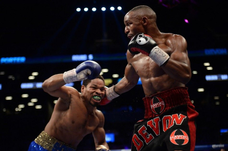 Dec 7, 2013; Brooklyn, NY, USA; and Shawn Porter (blue trunks) box during their IBF Welterweight Title bout at Barclays Center.