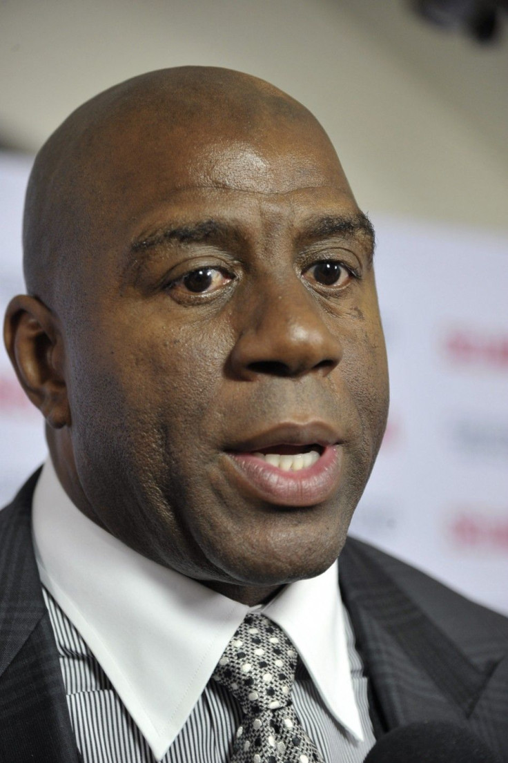 Basketball Hall of Famer Magic Johnson arrives during a gala event for the film &quot;Selma&quot; in Goleta, California December 6, 2014.