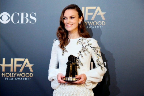 Actress Keira Knightley poses backstage with her supporting actress award for &quot;The Imitation Game&quot; at the Hollywood Film Awards in Hollywood