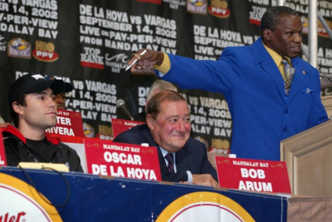 Arum and De La Hoya with Mayweather Sr. in 2002