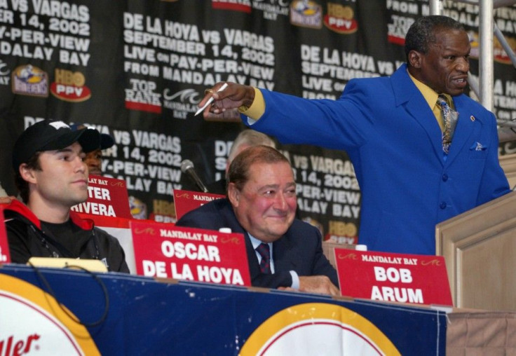 Arum and De La Hoya with Mayweather Sr. in 2002