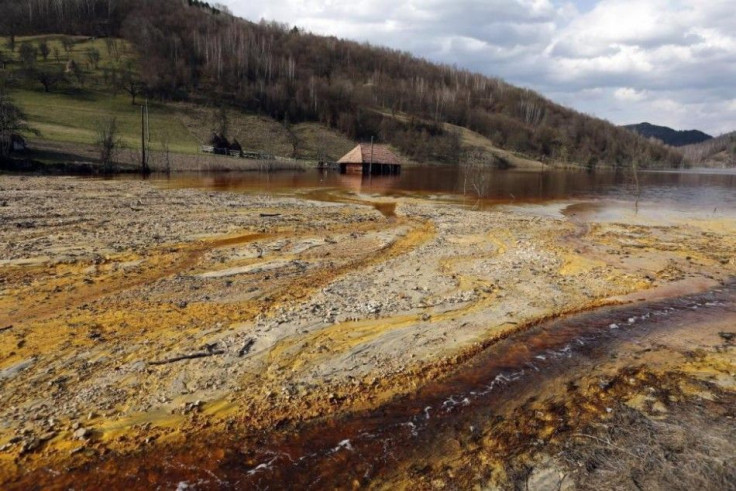 Lake and Village Contaminated with Mine Tailings