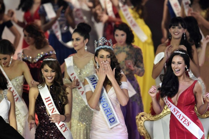 Rolene Strauss of South Africa (C) is crowned Miss World 2014 at the ExCel Centre in east London