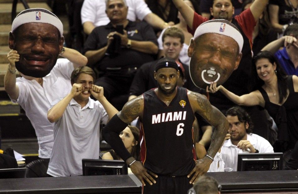 San Antonio Spurs fans taunt Miami Heats LeBron James during the third quarter in Game 2 of their NBA Finals basketball series in San Antonio, Texas, June 8, 2014. 