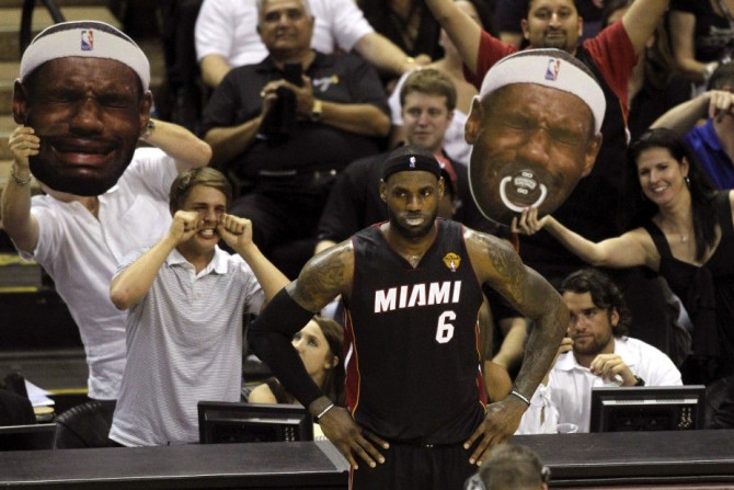 San Antonio Spurs fans taunt Miami Heat's LeBron James during the third quarter in Game 2 of their NBA Finals basketball series in San Antonio, Texas, June 8, 2014. 