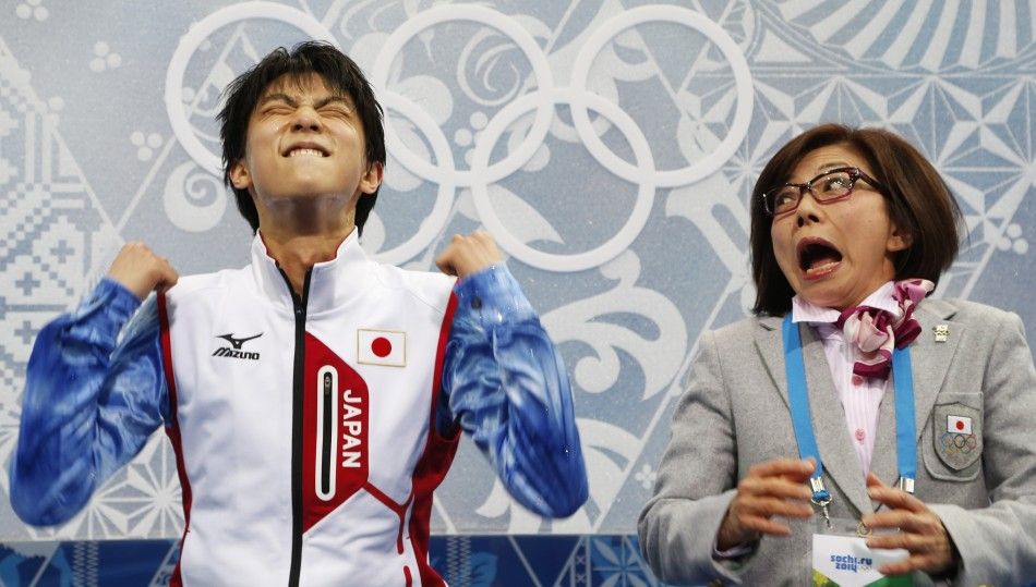 Japans Yuzuru Hanyu reacts in the quotkiss and cryquot area during the Figure Skating Mens Short Program at the Sochi 2014 Winter Olympics, February 13, 2014. 