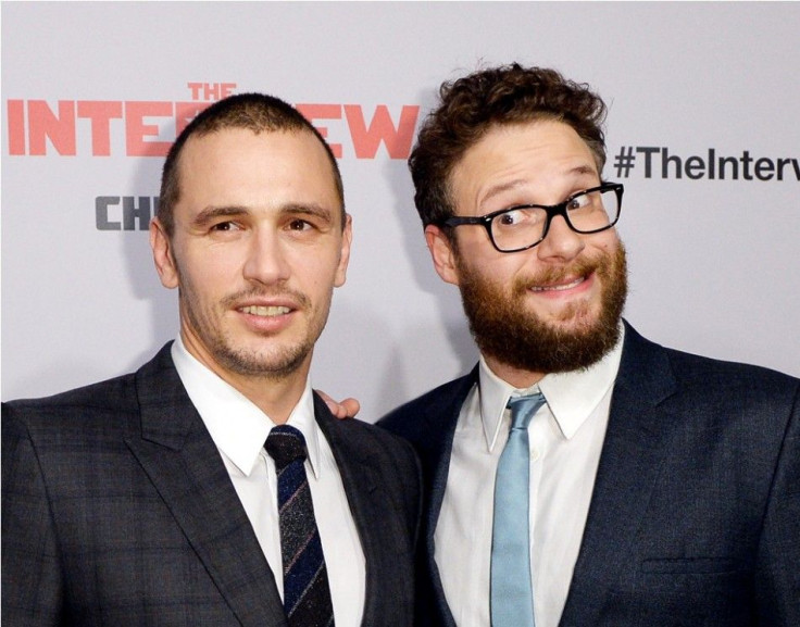 Cast members James Franco and Seth Rogen pose during premiere of the film &quot;The Interview&quot; in Los Angeles