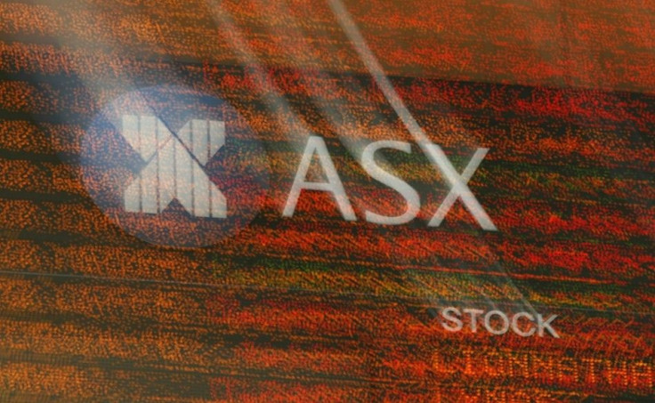 The stock board at the Australian Securities Exchange (ASX) is seen in central Sydney November 6, 2008. Australian shares fell 3.8 percent on Thursday, driven down by miners such as BHP Billiton Ltd, after U.S. economic data stoked fears of a prolonged sl