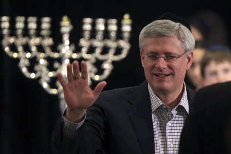 Canada's Prime Minister Stephen Harper greets the Jewish community