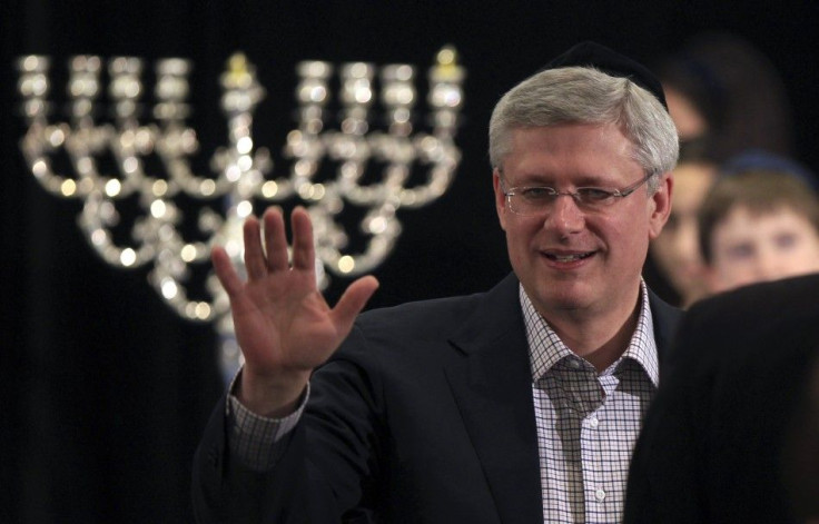 Canada's Prime Minister Stephen Harper greets the Jewish community