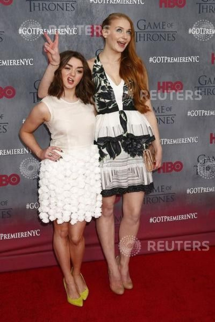 Cast members Maisie Williams and Sophie Turner arrive for the season four premiere of the HBO series &quot;Game of Thrones&quot;
