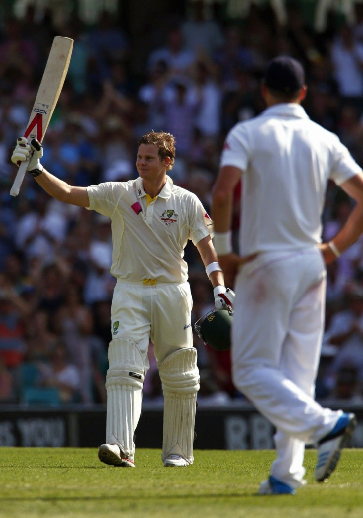 Australia&#039;s Steve Smith (L) celebrates reaching his century as England&#039;s Kevin Pietersen looks on during the first day of the fifth Ashes cricket test at the Sydney cricket ground January 3, 2014.