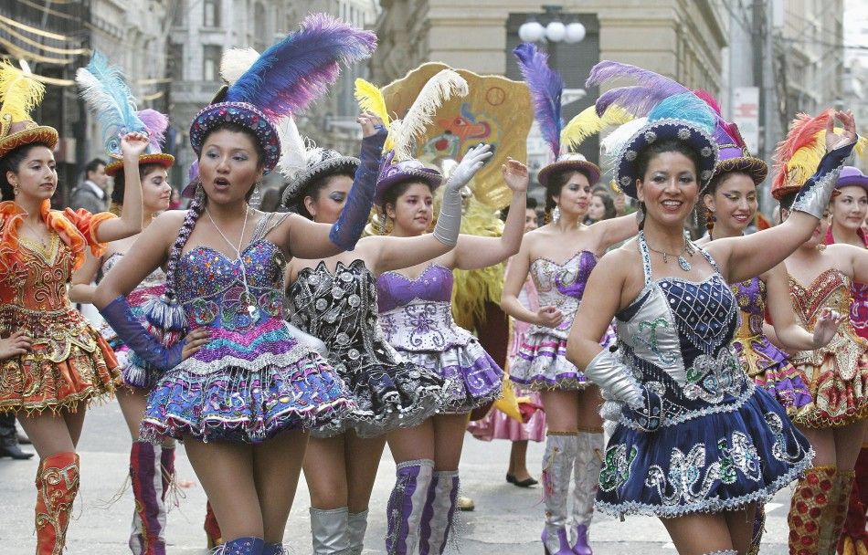 Members of a folkloric group perform during a ritual dance known as quottinkuquot during celebrations of the indigenous New Year in Valparaiso city, June 21, 2014.