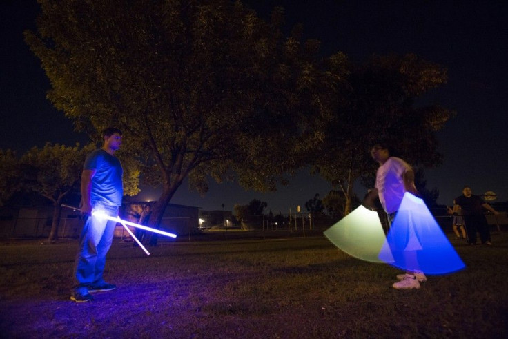 Enthusiasts With Their Lightsabers During A NGD (Nerd/Geek/Dork)
