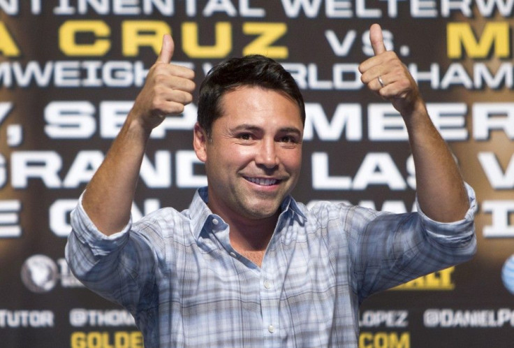 Oscar De La Hoya, president of Golden Boy Promotions, gives a thumbs up during an official weigh-in at the MGM Grand Garden Arena in Las Vegas, Nevada September 14, 2012.