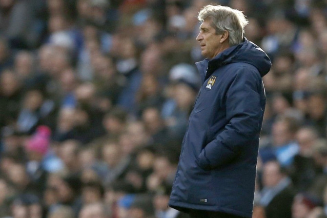 Manchester City manager Manuel Pellegrini reacts during their English Premier League soccer match against Crystal Palace at the Etihad Stadium in Manchester, northern England December 20, 2014.