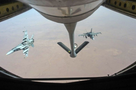 Royal Canadian Air Force CF-18 Hornets depart after refueling with a KC-135 Stratotanker assigned to the 340th Expeditionary Air Refueling Squadron over Iraq October 30, 2014. The jets are part of the Canadian Armed Forces&#039; contribution to coalition 