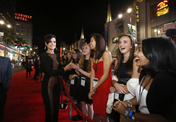 Cast member Jaimie Alexander greets fans at the premiere of &quot;Thor: The Dark World&quot; at El Capitan theatre in Hollywood, California November 4, 2013. The movie opens in the U.S. on November 8.