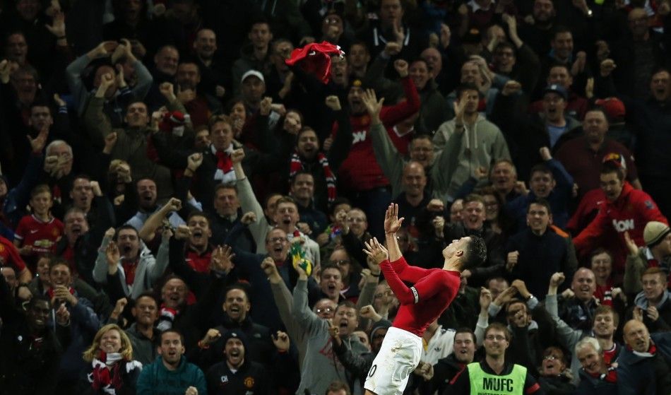 Manchester Uniteds Robin van Persie celebrates after scoring during their English Premier League soccer match against Chelsea at Old Trafford in Manchester, northern England October 26, 2014