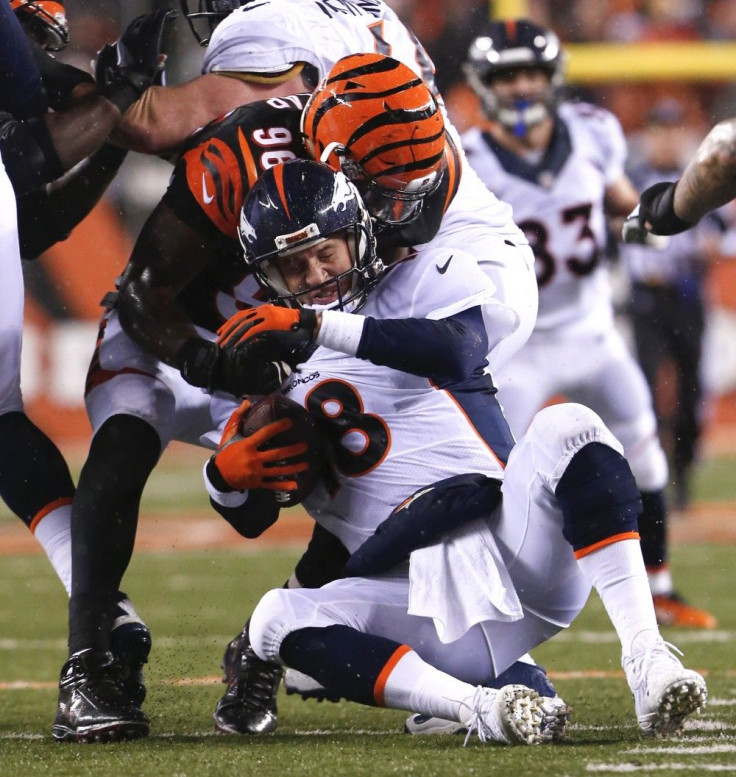 Bengals defensive end Carlos Dunlap sacks Broncos quarterback Peyton Manning