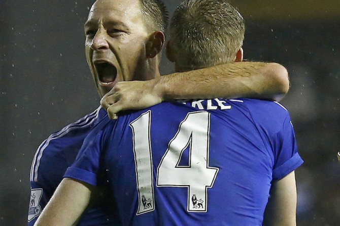 Chelsea's Andre Schurrle celebrates his goal against Derby County with John Terry (L) during their English League Cup quarter-final soccer match at the iPro Stadium in Derby, central England, December 16, 2014.