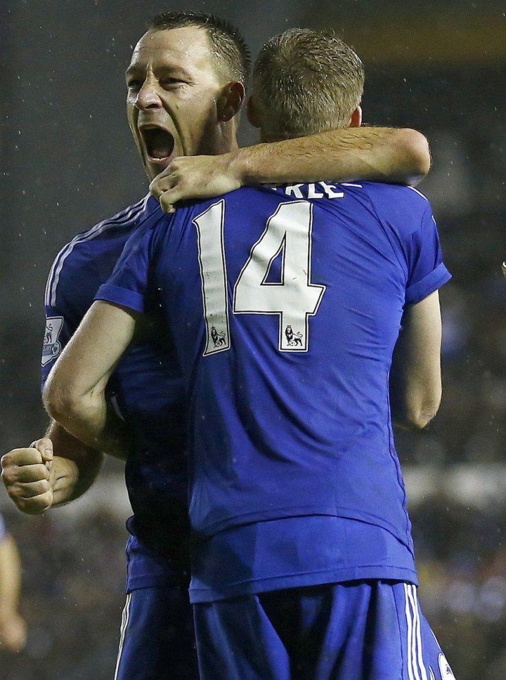 Chelsea's Andre Schurrle celebrates his goal against Derby County with John Terry (L) during their English League Cup quarter-final soccer match at the iPro Stadium in Derby, central England, December 16, 2014.