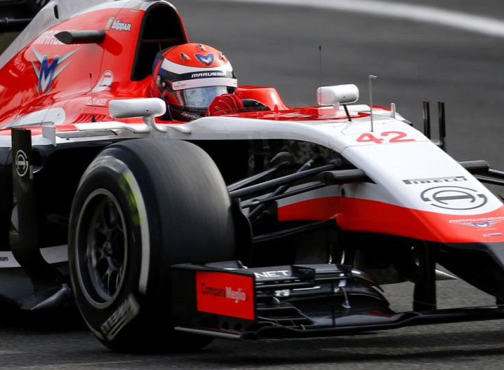 Marussia Ferrari Formula One driver Alexander Rossi of the U.S. drives during the first practice session at the Belgian F1 Grand Prix in Spa-Francorchamps August 22, 2014. REUTERS/Yves Herman