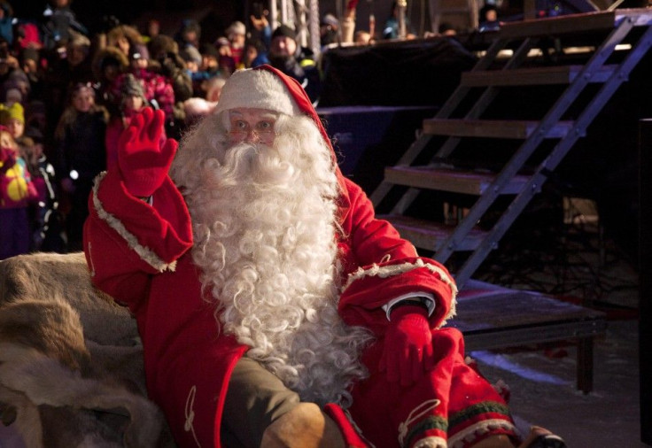 A man dressed as Santa Claus leaves for his annual Christmas journey from the Santa Claus Village at the Arctic Circle in Rovaniemi, Finnish Lapland December 23, 2014. REUTERS/Laura Haapamaki/Lehtikuva