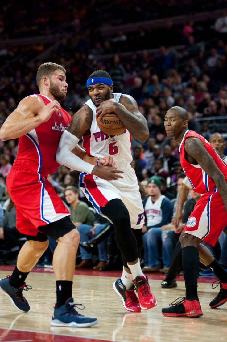 Nov 26, 2014; Auburn Hills, MI, USA; Detroit Pistons forward Josh Smith (6) drives to the basket against Los Angeles Clippers forward Blake Griffin (32) and guard Jamal Crawford (11) during the third quarter at The Palace of Auburn Hills. Los Angeles won 