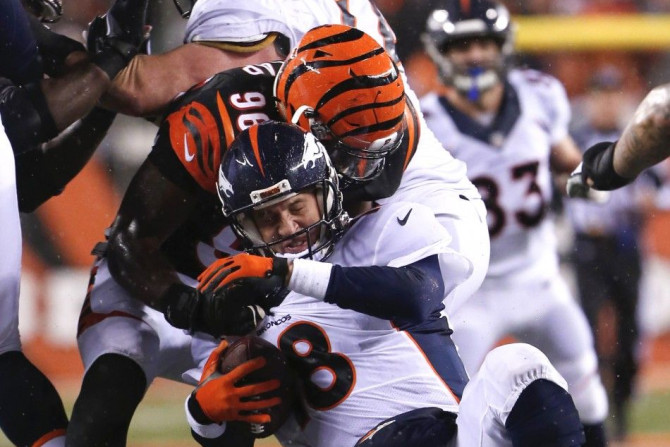 Denver Broncos quarterback Peyton Manning sacked