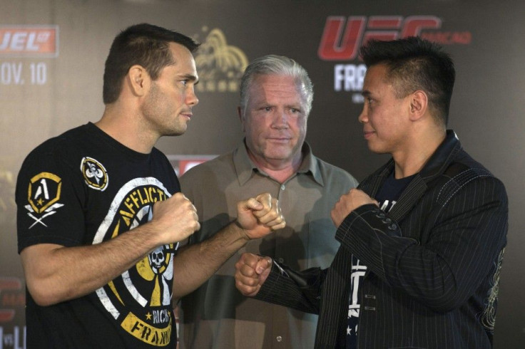 Rich Franklin (L) of the U.S. and South Vietnamese-born American Cung Le face-off after a news conference for their upcoming Ultimate Fighting Championship (UFC), a professional mixed martial arts (MMA) competition in Hong Kong November 7, 2012. The fight