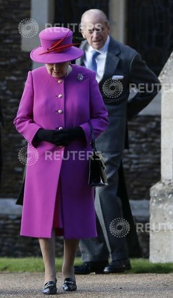 Britains Queen Elizabeth and Prince Philip leave a Christmas Day morning service 