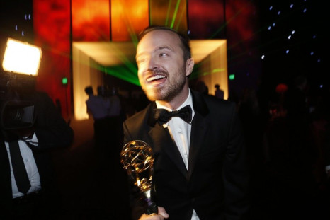 Aaron Paul, winner for Outstanding Supporting Actor in a Drama Series for &quot;Breaking Bad&quot; arrives at the Governors Ball for the 66th Primetime Emmy Awards in Los Angeles, August 25, 2014.