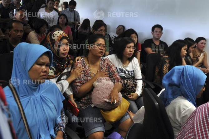 Family members of passengers on board AirAsia flight QZ8501