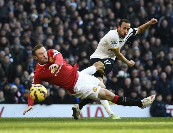 Manchester United&#039;s Wayne Rooney (L) challenges Tottenham Hotspur&#039;s Andros Townsend during their English Premier League soccer match at White Hart Lane in London December 28, 2014.