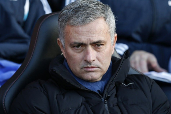 Chelsea manager Jose Mourinho sits in the dug out during his team's English Premier League soccer match against Southampton at St Mary's Stadium in Southampton, southern England, December 28, 2014.