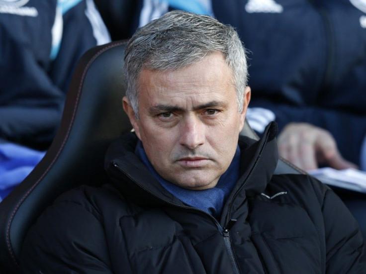 Chelsea manager Jose Mourinho sits in the dug out during his team's English Premier League soccer match against Southampton at St Mary's Stadium in Southampton, southern England, December 28, 2014.