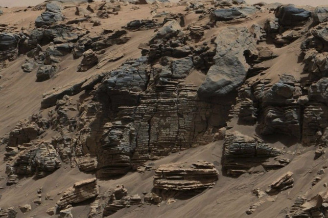 An evenly-layered rock on the planet Mars, photographed by the Mast Camera (Mastcam) on NASA's Curiosity Mars Rover is shown in the NASA handout provided December 9, 2014. It shows a pattern typical of a lake-floor sedimentary deposit not far from wh