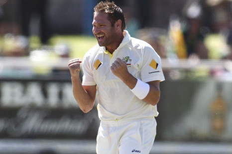 Australia&#039;s Ryan Harris celebrates the wicket of Alviro Petersen (not in picture) during the fourth day of the third cricket test match at Newlands Stadium in Cape Town, March 4, 2014.