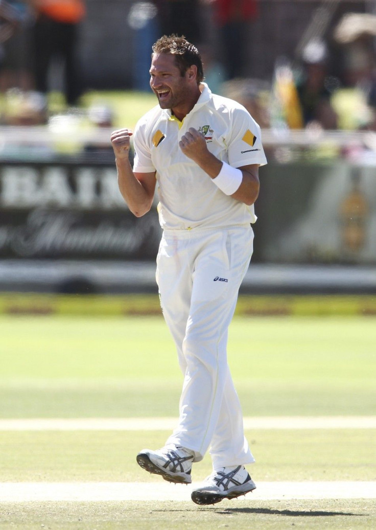 Australia&#039;s Ryan Harris celebrates the wicket of Alviro Petersen (not in picture) during the fourth day of the third cricket test match at Newlands Stadium in Cape Town, March 4, 2014.