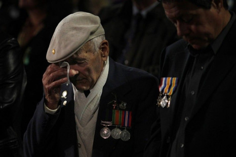 A former Australian serviceman wipes away tears during a dawn service to commemorate ANZAC Day at the Martin Place cenotaph in Sydney April 25, 2011. ANZAC stands for Australian and New Zealand Army Corp and ANZAC day is marked annually with hundreds of d