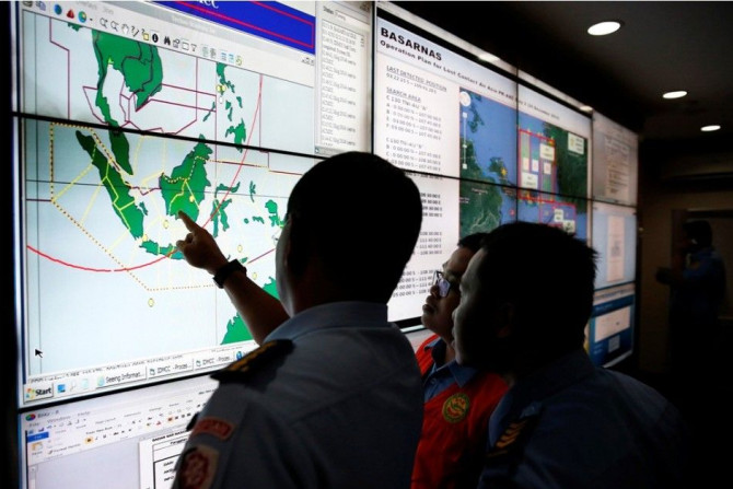 Military and rescue authorities monitor progress in the search for AirAsia Flight QZ8501