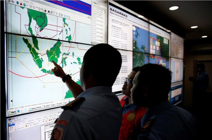 Military and rescue authorities monitor progress in the search for AirAsia Flight QZ8501
