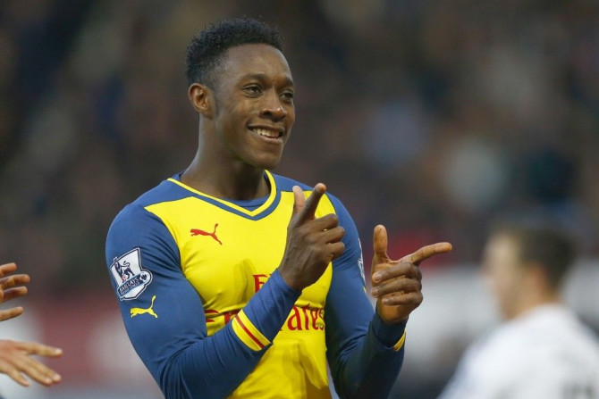 Arsenal's Danny Welbeck celebrates after scoring a goal against West Ham United during their English Premier League soccer match at Upton Park in London December 28, 2014.